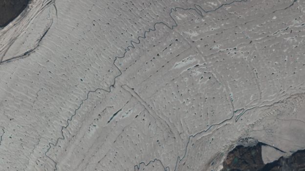 Climate change: Warmth shatters section of Greenland ice shelf